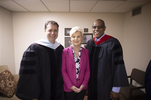 Dennis Gilliam, Ed.D.; Becky Watson; and Bobby Humphrey smile to camera.